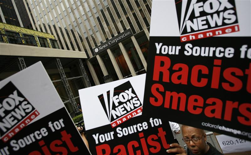 Members of Color of Change protest against Fox News Channel outside the News Corporation building in New York