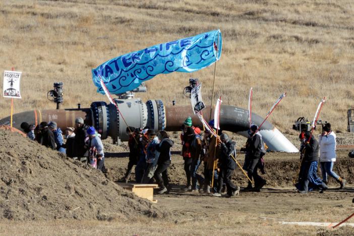 Protesters march along the pipeline route during a protest against the Dakota Access pipeline near the Standing Rock Indian Reservation in St. Anthony, North Dakota, U.S. November 11, 2016. REUTERS/Stephanie Keith