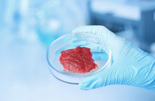 Luke A. MacQueen, a bio engineering research assistant at Harvard University helped create a more realistic texture for the lab grown meat.  
